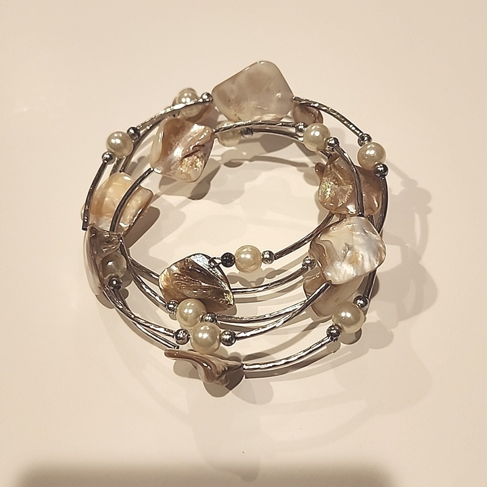 Beaded shell and silver wrap bracelet. Great condition